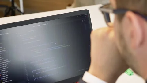 Develop internet project. Closeup coding on screen, hands type html code. Stock Footage 248230188