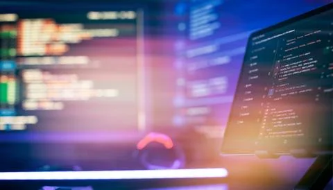 Develop internet project. Code and programming on screen laptop. Stock Photos