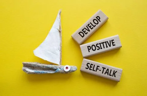 Develop positive self-talk symbol. Concept words Develop positive self-talk.. Stock Photos