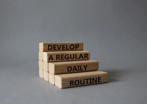 Develop a regular daily routine symbol. Concept words Develop a regular dai.. 스톡 사진