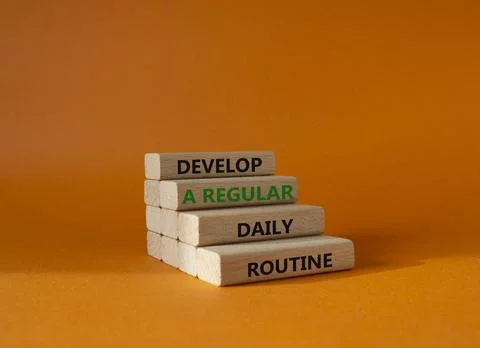 Develop a regular daily routine symbol. Concept words Develop a regular dai.. Stock Photos