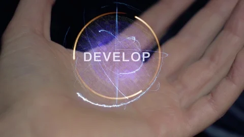 Develop text hologram on a female hand Stock Footage 108395798