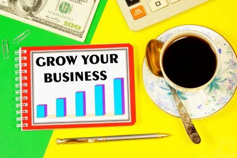Develop your business-lettering text on the planning Notepad. Stock Photos