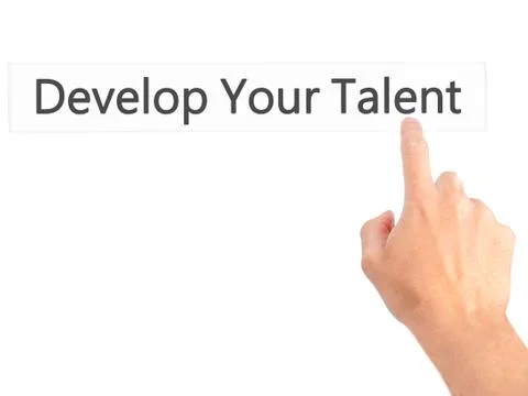 Develop Your Talent - Hand pressing a button on blurred background concept .  Stock Photos