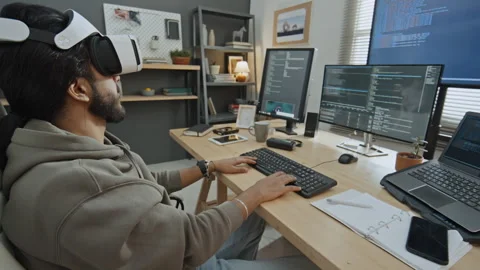 Developer in AR Headset Writing Computer Code for 3D Model Stock Footage 255929066