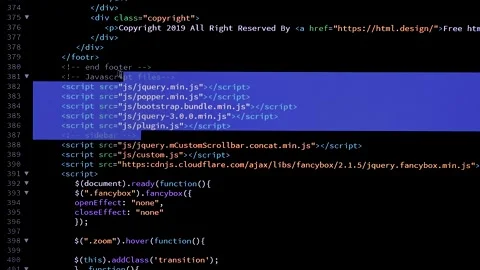 Developer is browsing and marking html code on the computer screen. Code Stock Footage 143273742