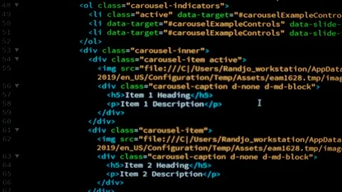 Developer is browsing html code on the computer screen. HTML Web Page Code Stock Footage 141018366