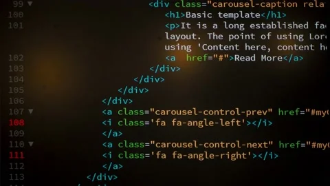 Developer is browsing html code on the computer screen. HTML Web Page Code Stock Footage 143385612