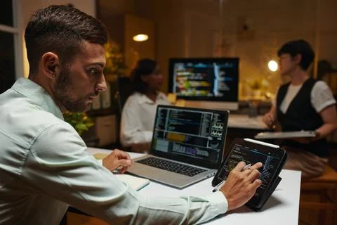 Developer Checking Programming Code 写真素材