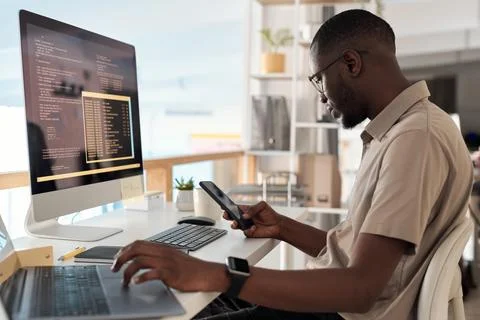 Developer Checking Text Messages 스톡 사진