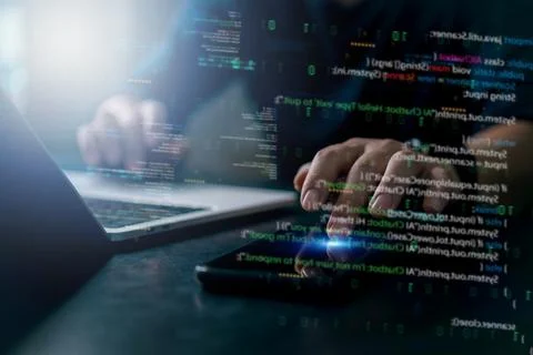 Developer coding in dark room with futuristic interface. Binary and source .. Foto stock