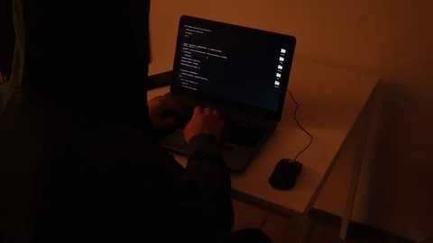 Developer coding the first artificial intelligence on laptop Stock Footage 120616602