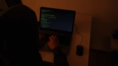 Developer coding the first artificial intelligence on laptop Stock Footage 120617565
