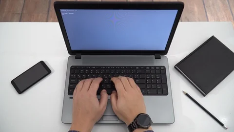Developer coding on a laptop - top view Stock Footage 128472326