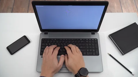 Developer coding on a laptop - top view Stock Footage 128472465