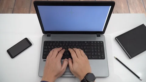 Developer coding on a laptop - top view Stock Footage 128472848