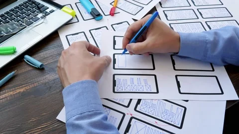 The developer creates a UI user interface design for a mobile application. Stock Footage 139275316