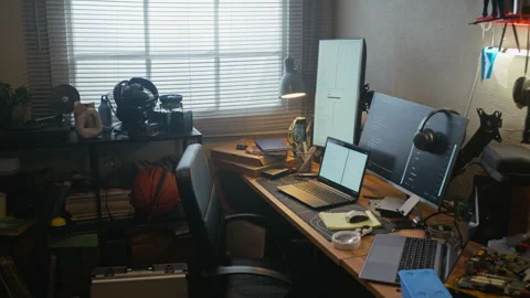 Developer Desk with Multiple Screens Showing Code Writing Interface Stock Footage 338421678