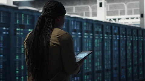 Developer doing data center automation using AI neural networks on tablet Stock Footage 317126325