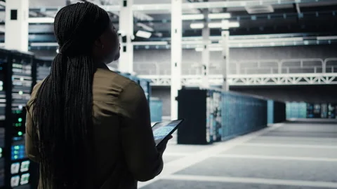 Developer doing data center automation using AI neural networks on tablet Stock Footage 317204948