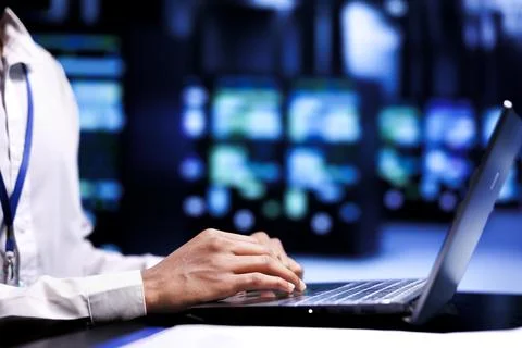 Developer examining supercomputer 스톡 사진