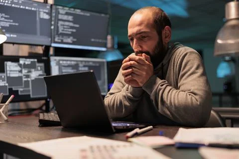 Developer feeling cold and drinking cup of coffee Stock Photos