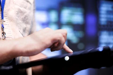 Developer in front of mainframe rows Stock Photos