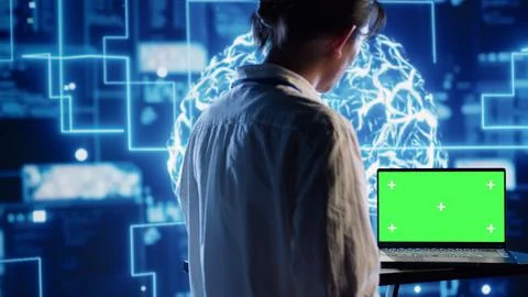 Developer green screen laptop for AI use Stock Photos