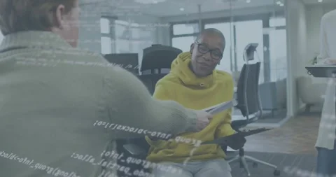 Developer handing code pages to mustard reviewer during meeting for code review, Stock Footage 318063846