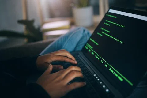 Developer hands, code overlay and laptop typing with cybersecurity, hacker and Stockfoto's