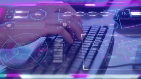 Developer hands entering hovering keyboard typing while UI gauges pulsing Stock Footage 333829869