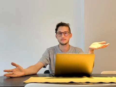 Developer has placed his hands in different directions with indignation 스톡 사진