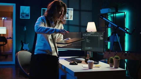 Developer holding disposable cup of coffee entering home office Stock Footage 283595083