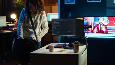 Developer holding disposable cup of coffee entering home office Stock Footage 283692920