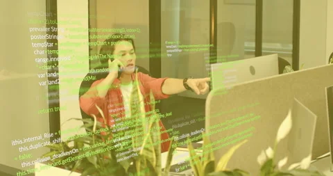 Developer initiating mobile call in office growing code overlay and showing code Stock Footage 315505571