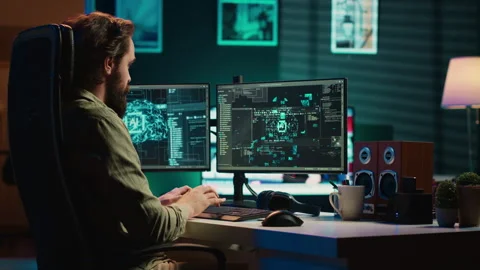 Developer inserting disk into PC containing conscient AI waving hand Stock Footage 266952735