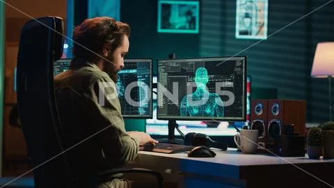 Developer inserting disk into PC containing conscient AI waving hand 스톡 사진