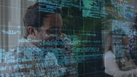 Developer lifting handset scanning translucent code overlay confirming routines Stock Footage 320213485