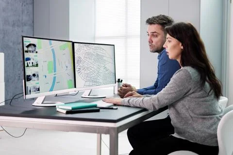 Developer Looking At Land Plot Map Stock Photos