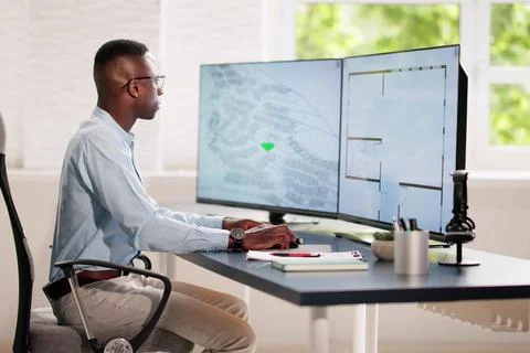 Developer Looking At Land Plot Map Fotos de archivo