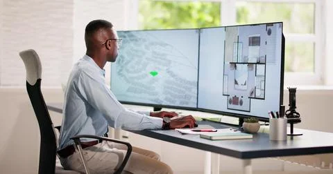 Developer Looking At Land Plot Map Fotos de archivo