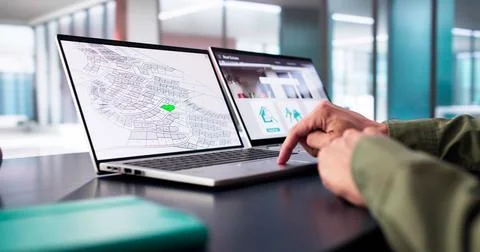 Developer Looking At Land Plot Map Fotos de archivo