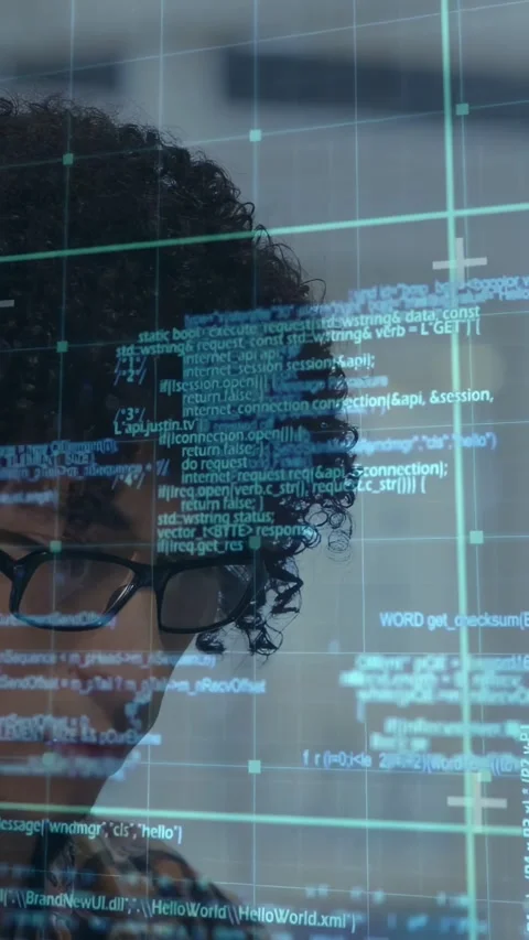 Developer lowering gaze to keyboard, causing HUD code grid and crosshair Stock Footage 333020831