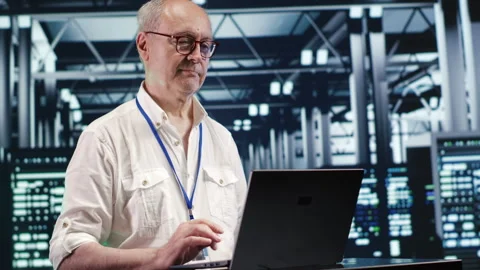 Developer optimizing data center Stock Footage 247900391