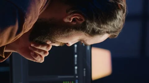 Developer overthinking solutions while doing programming during remote job shift Stock Footage 265107453