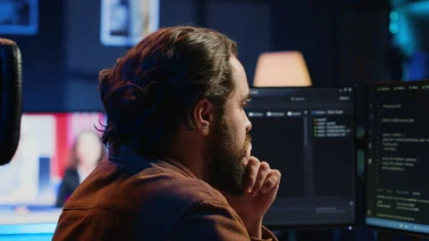 Developer overthinking solutions while doing programming during remote job shift Stock Footage 265618195