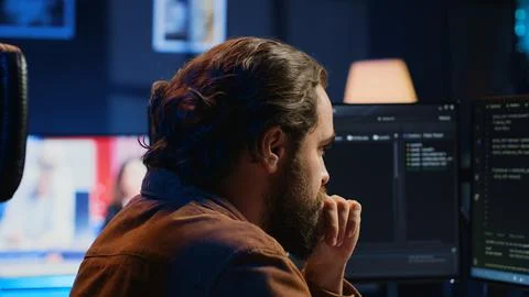 Developer overthinking solutions while doing programming during remote job shift Stock Photos