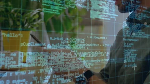 Developer picking smartphone after code overlay expansion for reviewing code at Stock Footage 313493847