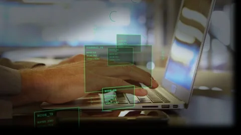 Developer placing hands on laptop, typing in cafe, green HUD animating over Stock Footage 333774627