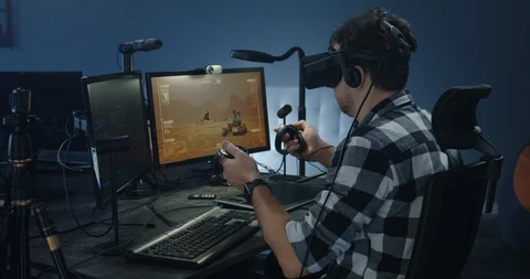 Developer playing a VR game or simulator Video stock 125170985